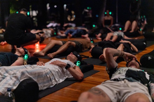 Evening 9D Breathwork session with glowing headphones
